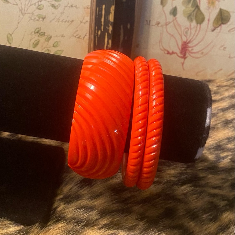 Three Heavy Carve Papaya Splendette Bangles